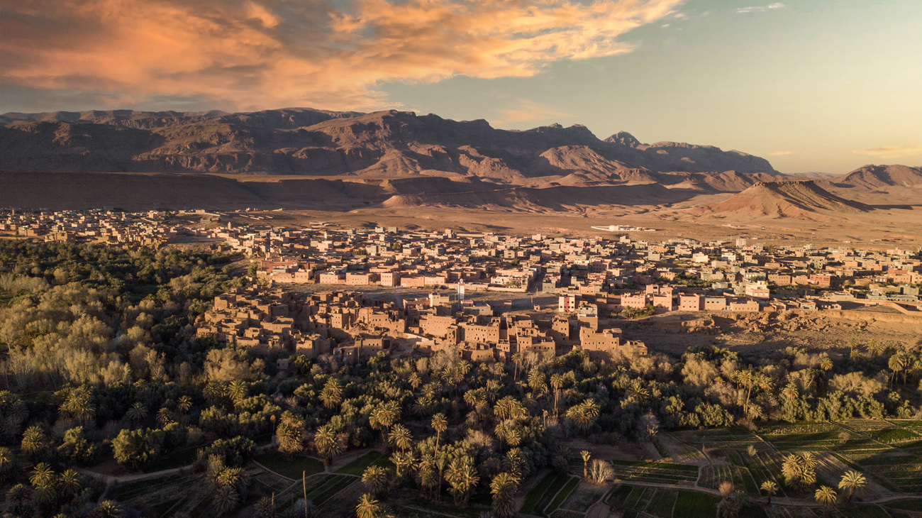 Dawn over a kasbah oasis